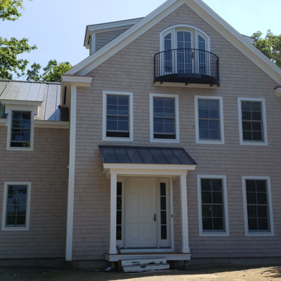 Beige house with balcony. Beige house with balcony.