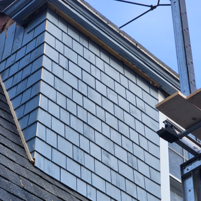 Blue siding on a house. Blue siding on a house.