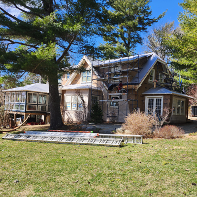 Brown cottage with gray roof. Brown cottage with gray roof.