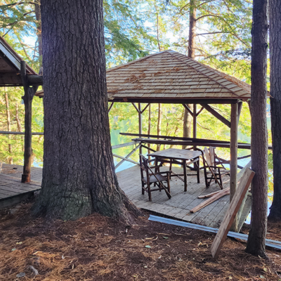 Brown gazebo in the forest. Brown gazebo in the forest.