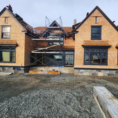 Front view of house under construction. Front view of house under construction.