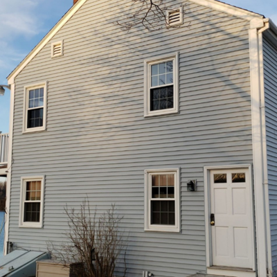 Gray house with chimney. Gray house with chimney.