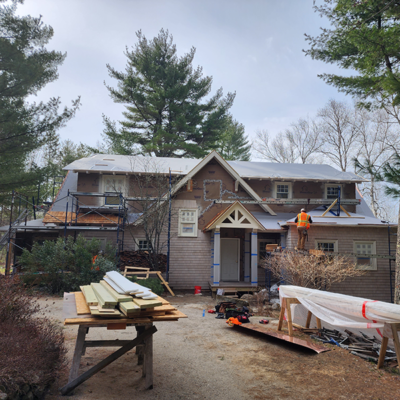 Tan house under construction. Tan house under construction.