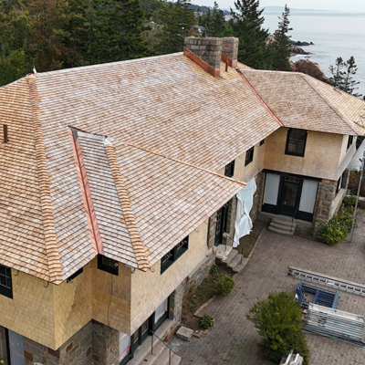 Top view of a brown roof with trees. Top view of a brown roof with trees.