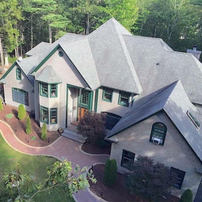 Top view of house with green window frames. Top view of house with green window frames.
